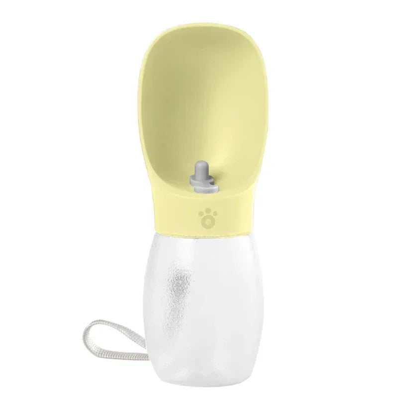 Portable yellow pet water bottle with attached drinking cup and carrying strap