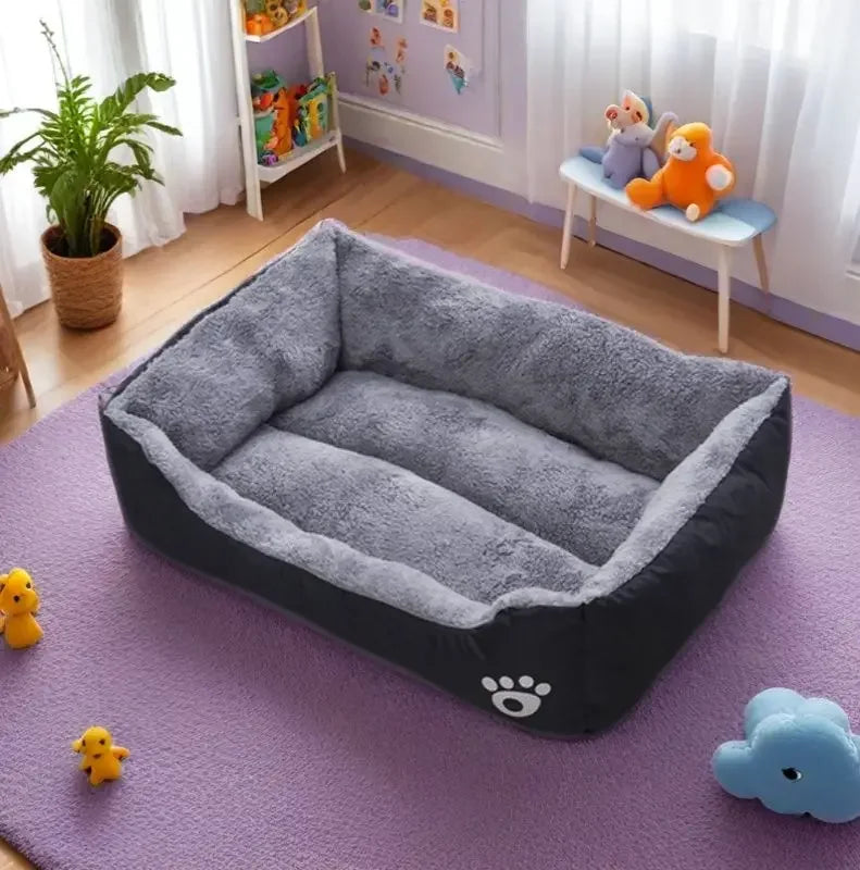 Plush gray pet bed with paw print on purple rug, toys and decor in cozy room