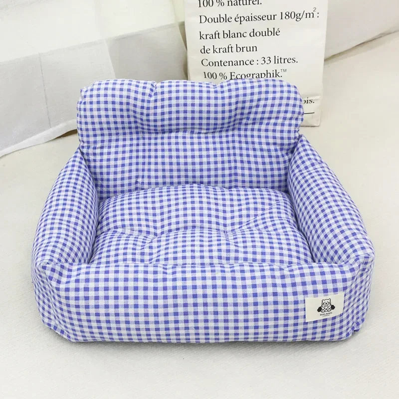 Blue and white gingham checkered pet bed with padded sides and backrest, square shape